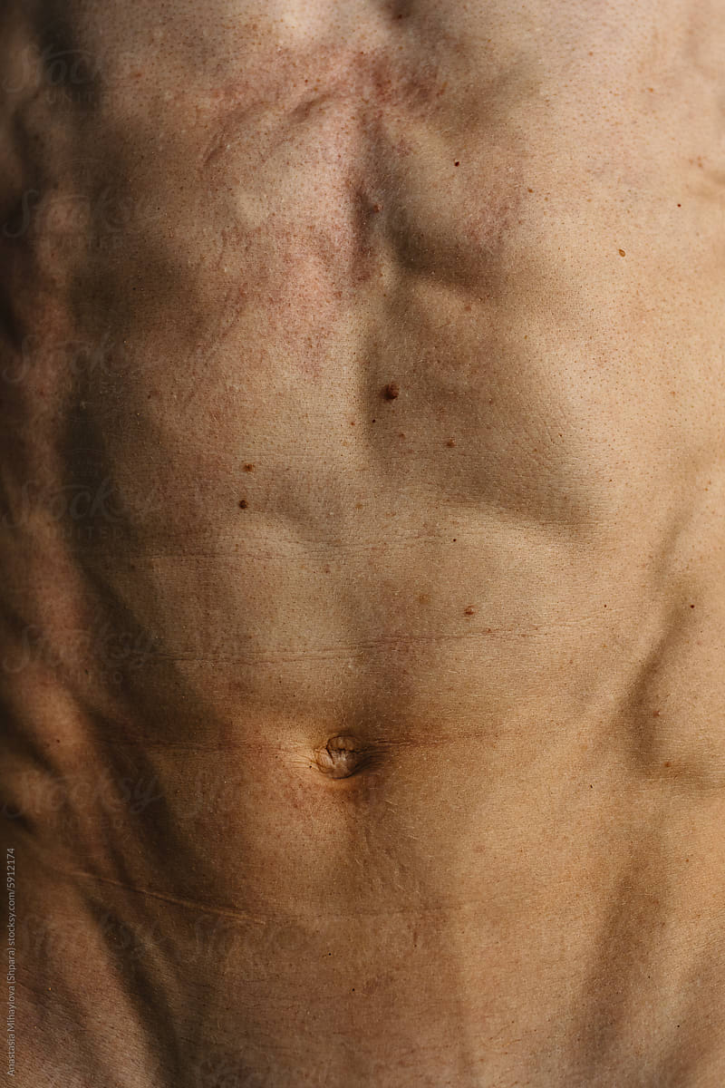 Close up Man bare-chested athlete, skin texture of torso of a man