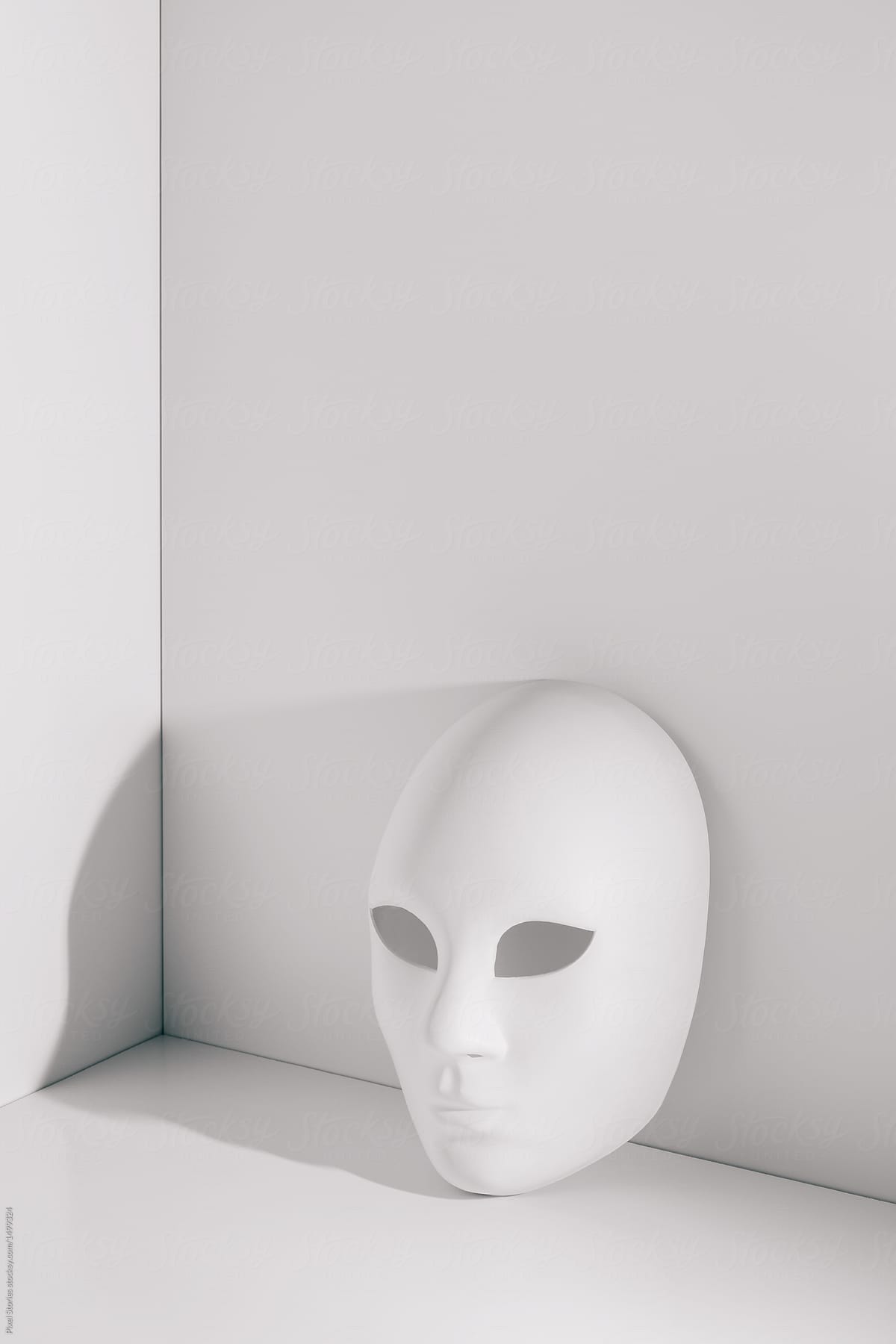 White spooky mask on white