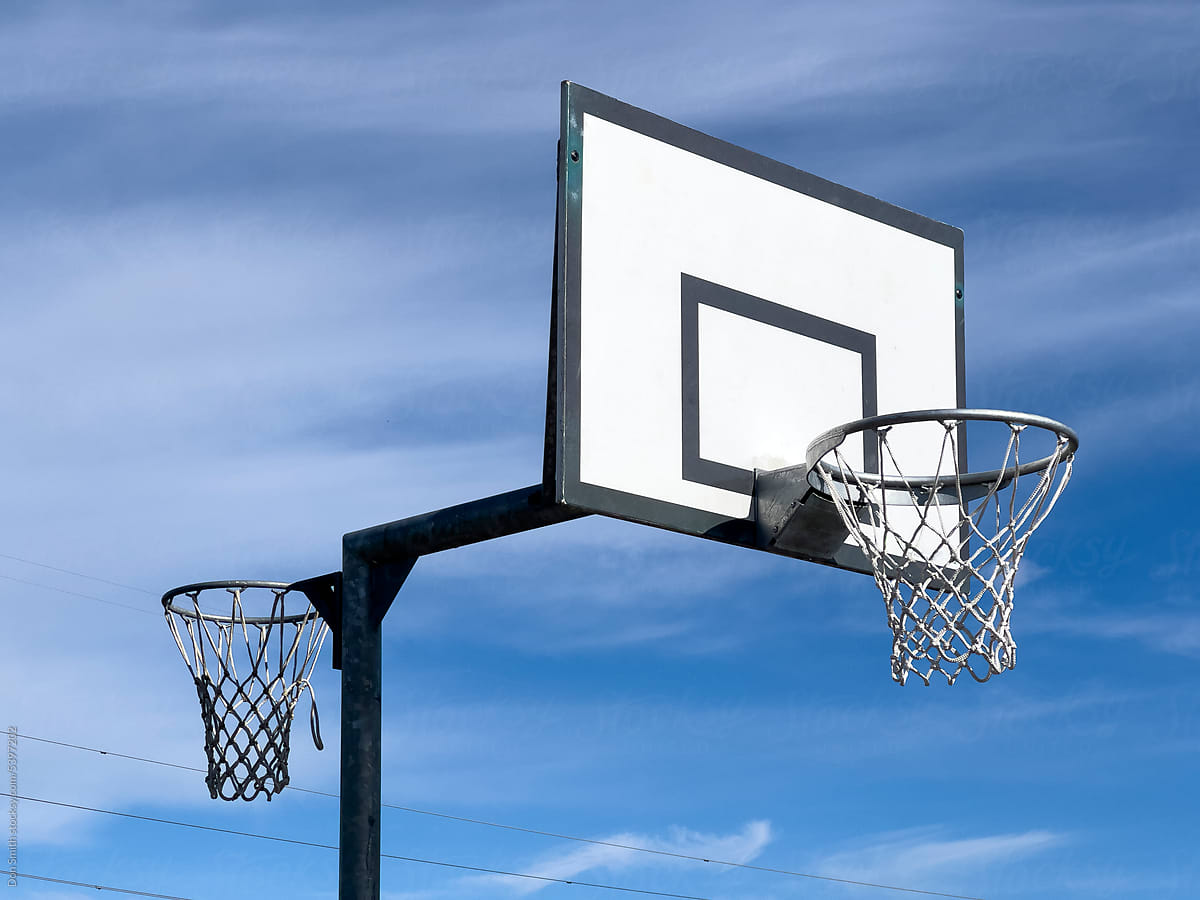 Basket ball hoop and board with netball hoop