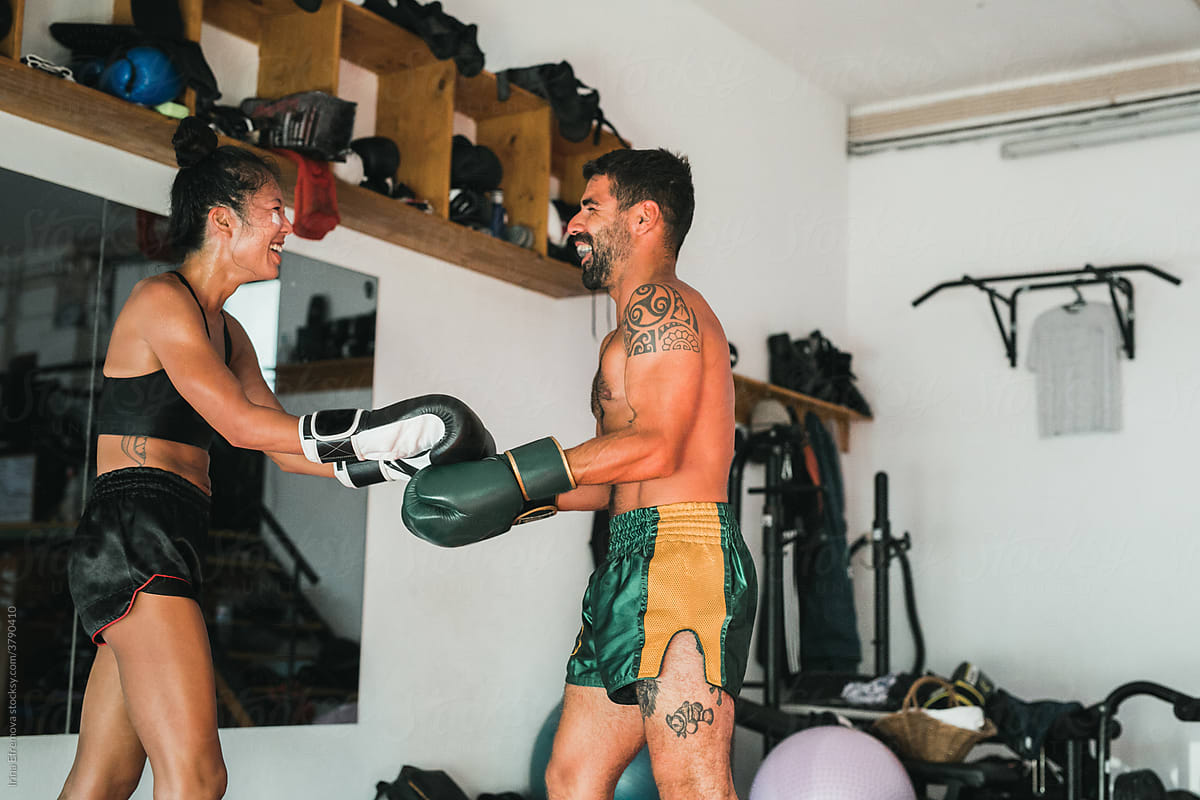 Two Muay Thai Athletes Tapping Gloves