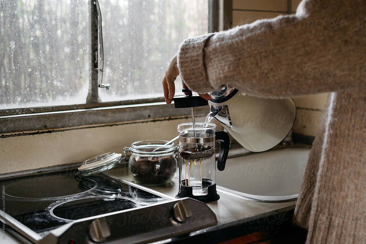 Anonymous woman preparing a coffe