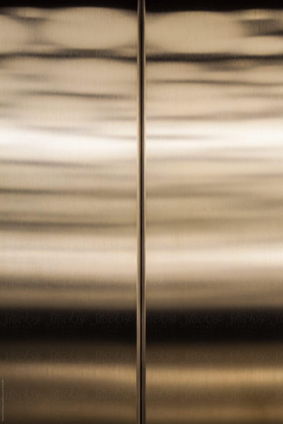 Metal reflections in elevator door