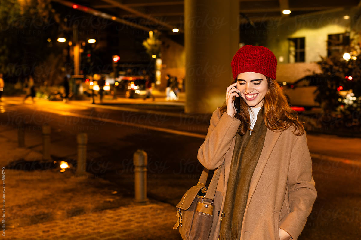 girl using the phone at night