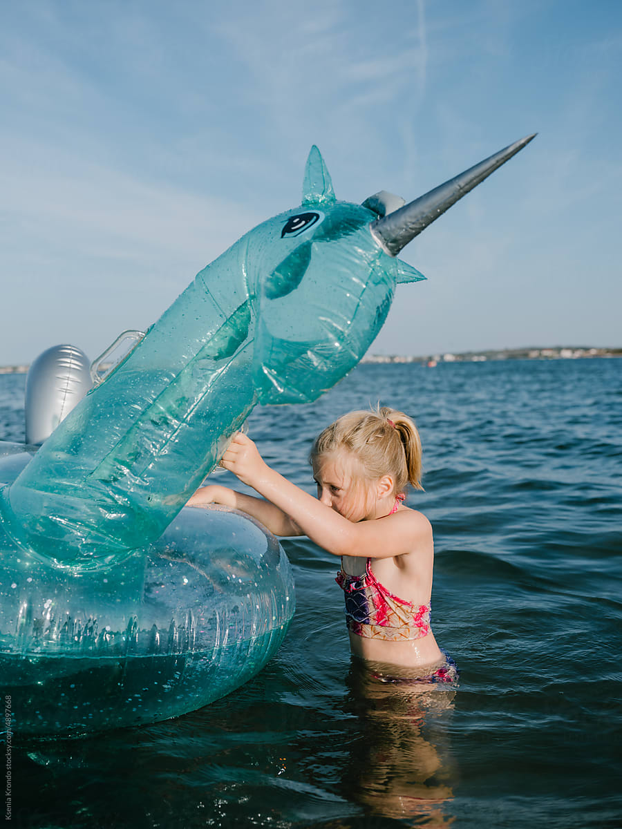 Seaside Girl Adventure with Inflatable Unicorn