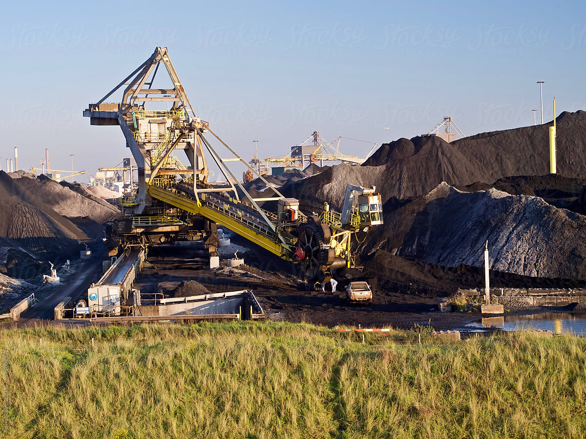 Fossil fuel carbon economy, piles of coal for energy production