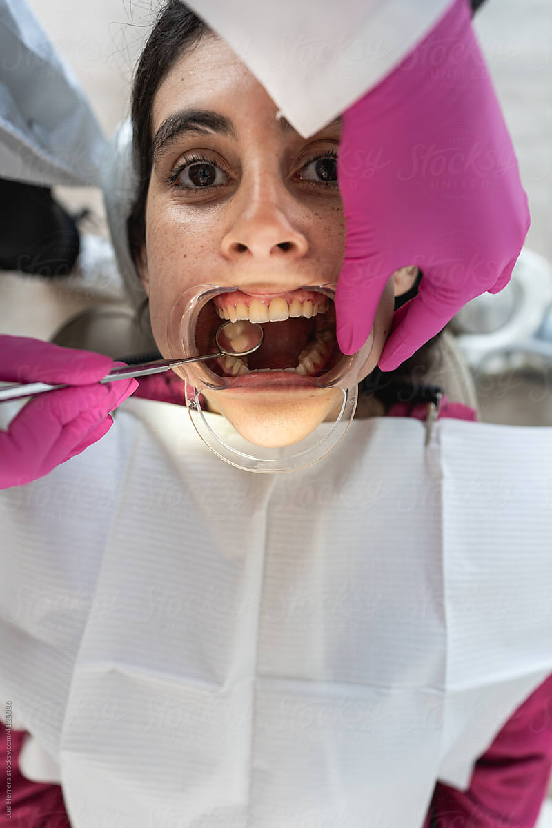 close up woman patient at the Dentist