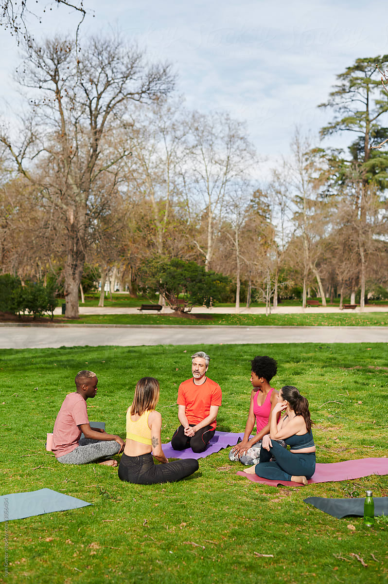 People talking after yoga class