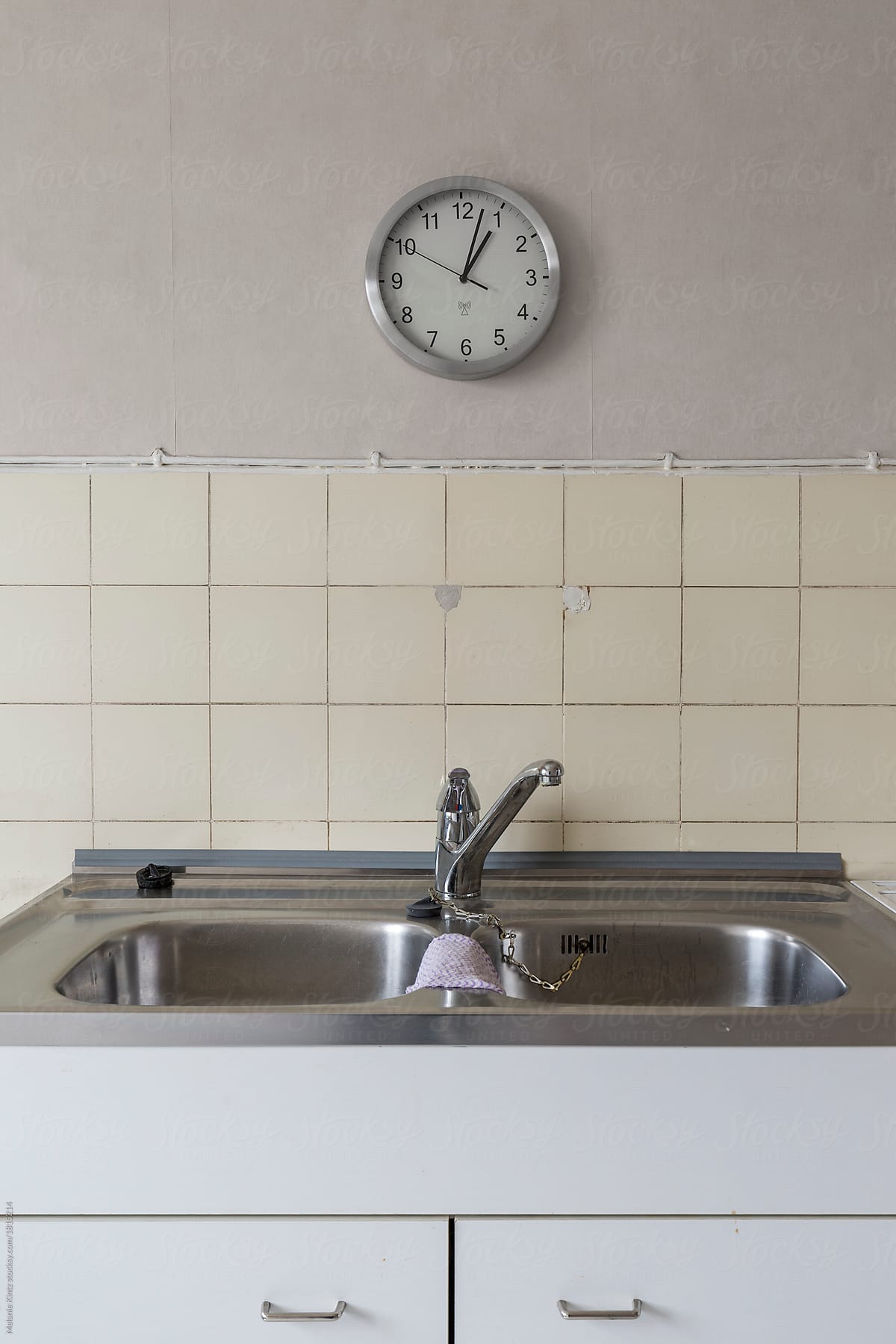 Kitchen sink in an out-of-date kitchen