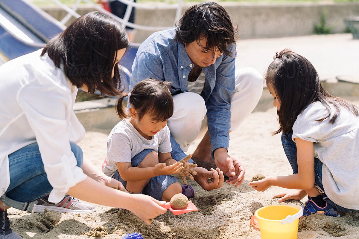 Japanese family together in a park in Japan