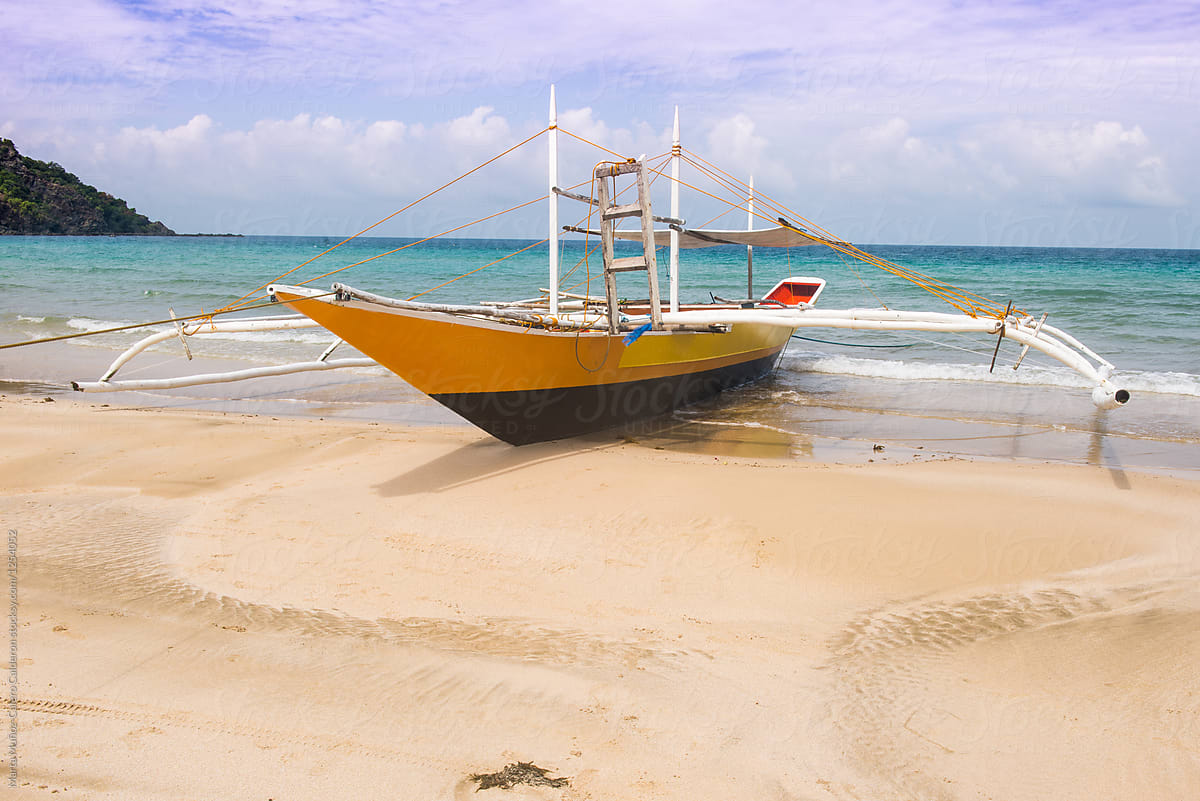 Traditional Philippines Fishing Boat With Outriggers, Often Known