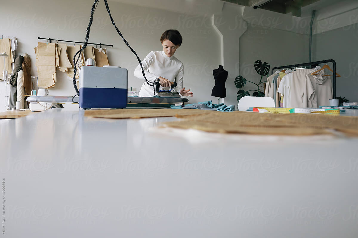 Atelier workplace. Seamstress. Ironing. Create apparel. Fashion