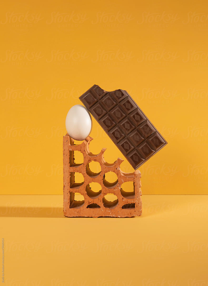 Broken brick with chocolate and egg