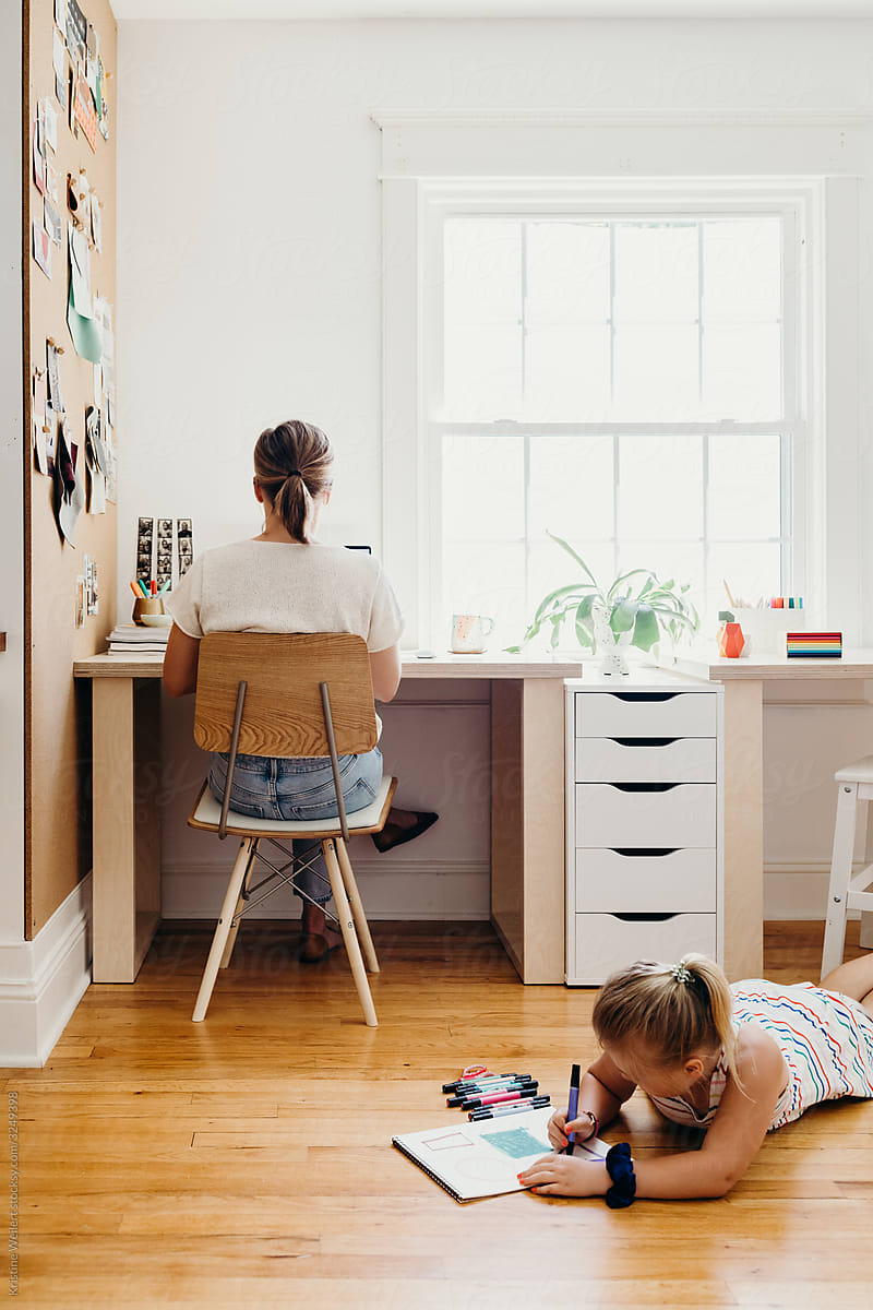 Mom Working From Home with Daughter