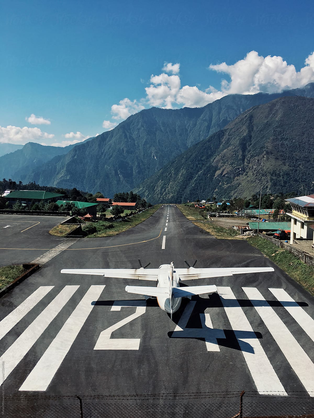 airplane-on-the-runway-by-stocksy-contributor-marko-stocksy
