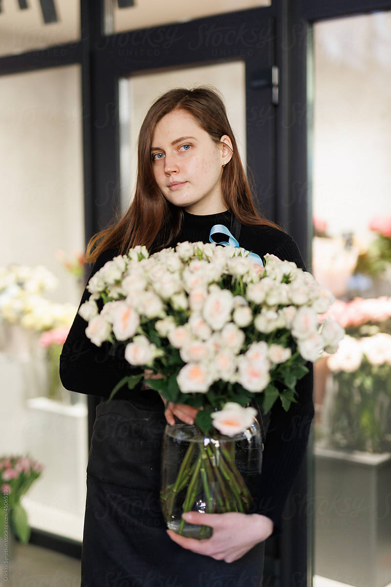 Portrait of flower dealer in floral shop