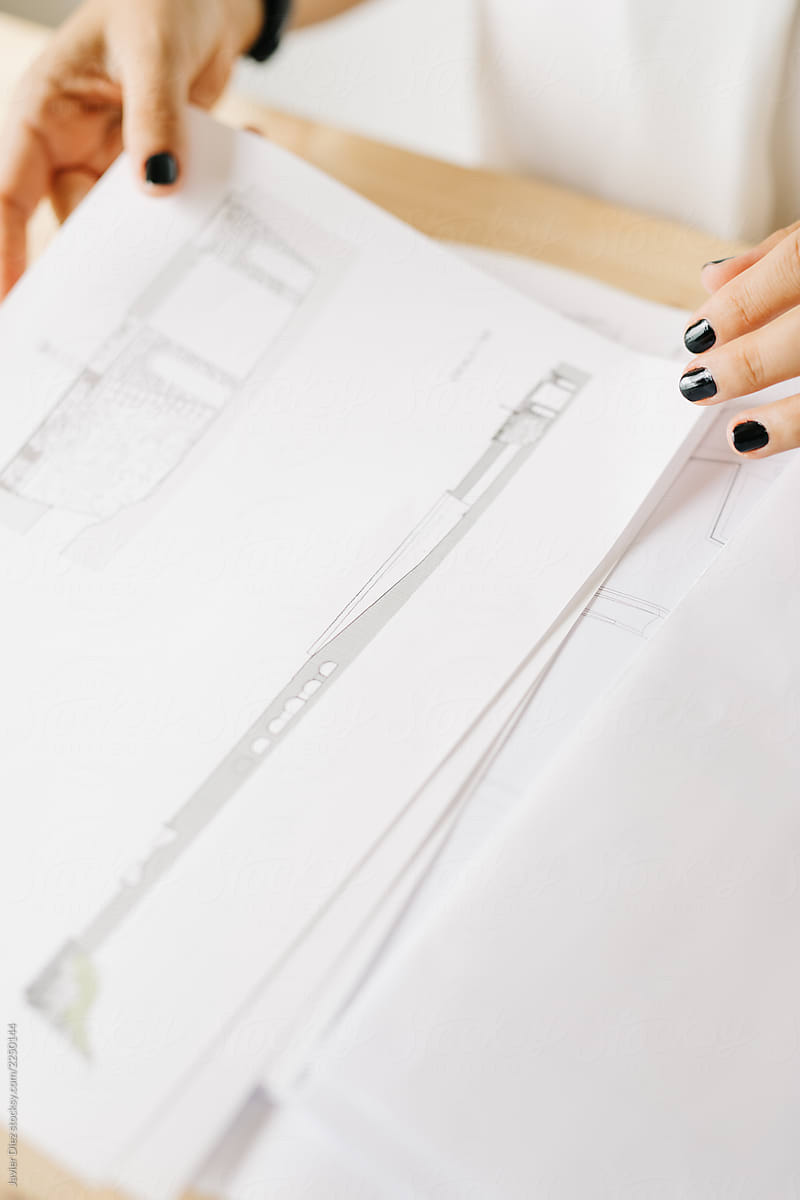Woman working with house plans