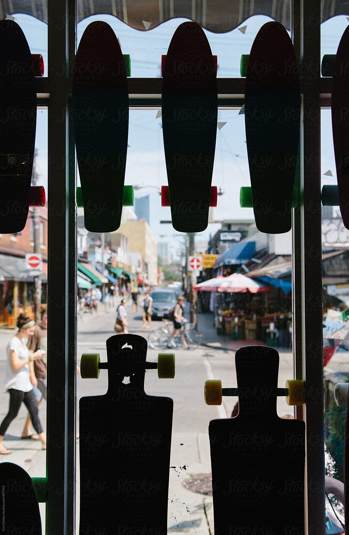 Skateboards hanging in a shop window