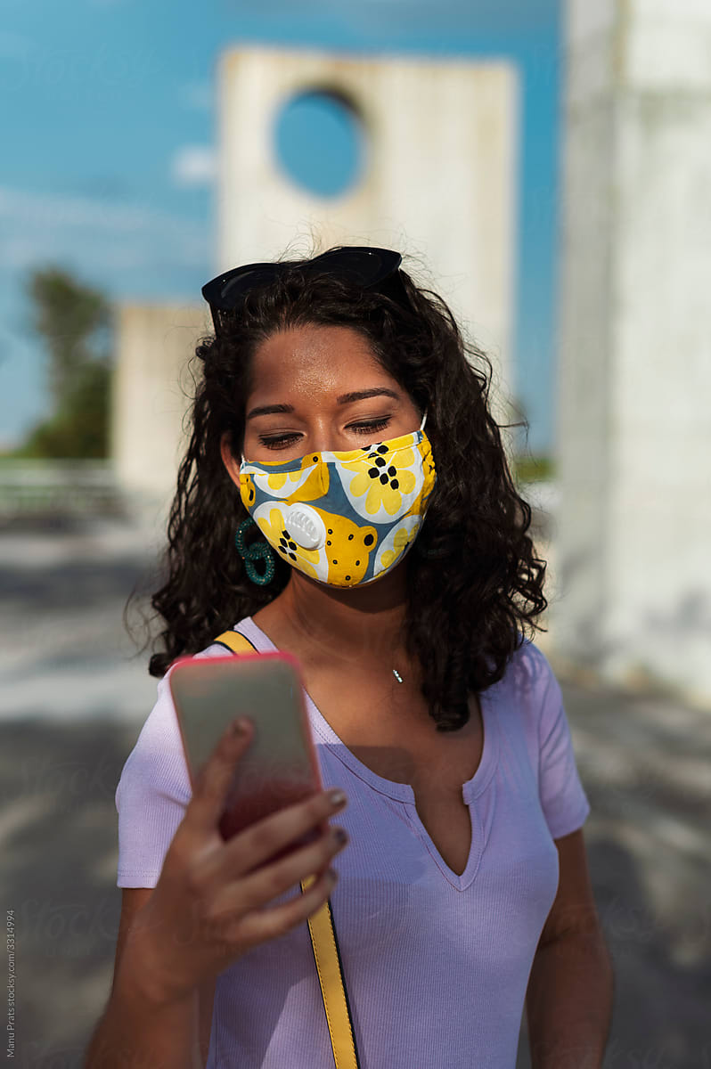 Browsing phone in face mask
