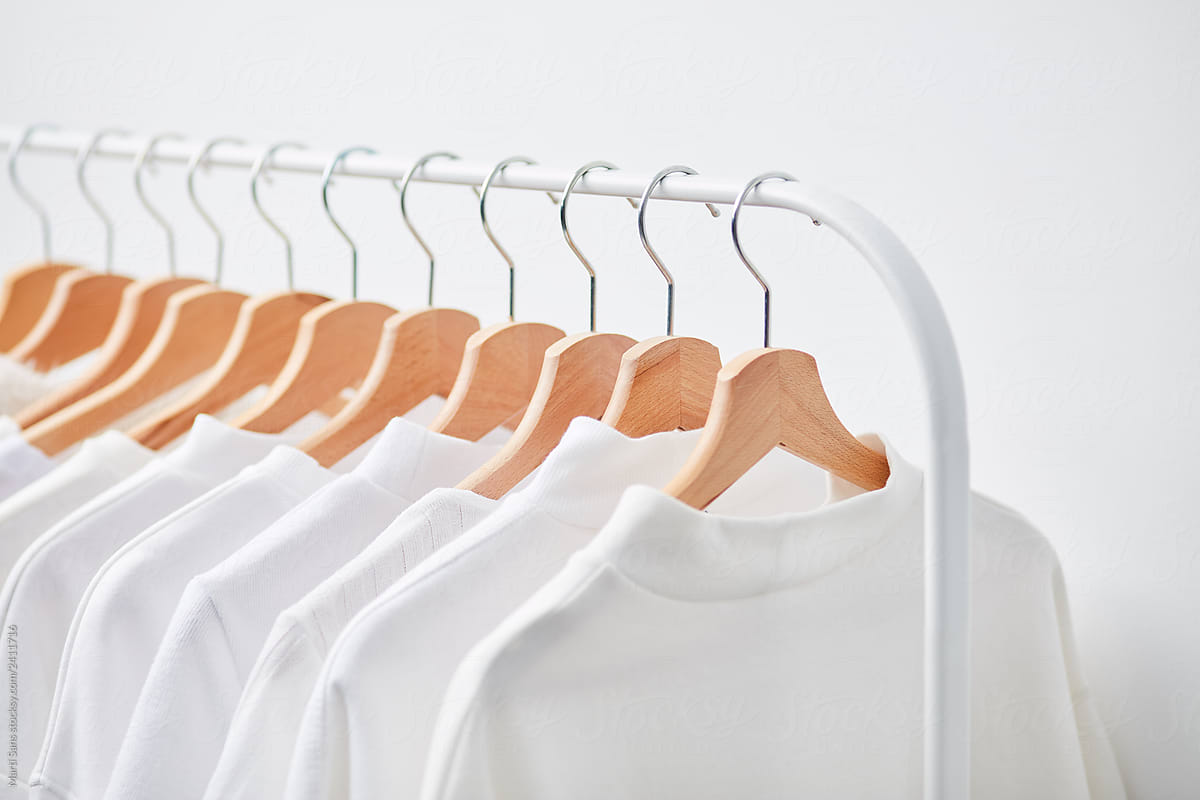 Rack Of White Clothes On Hangers by Stocksy Contributor Martí Sans -  Stocksy