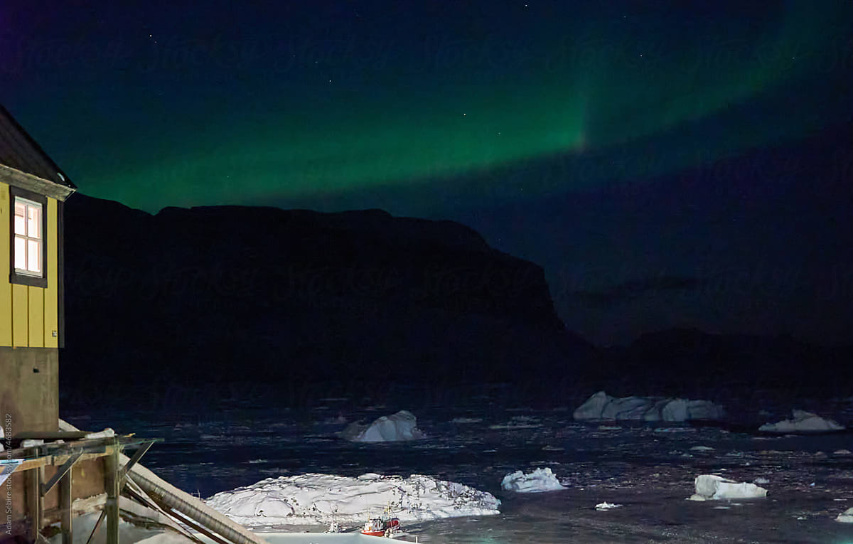 Greenland polar night - aurora borealis northern lights and icebergs
