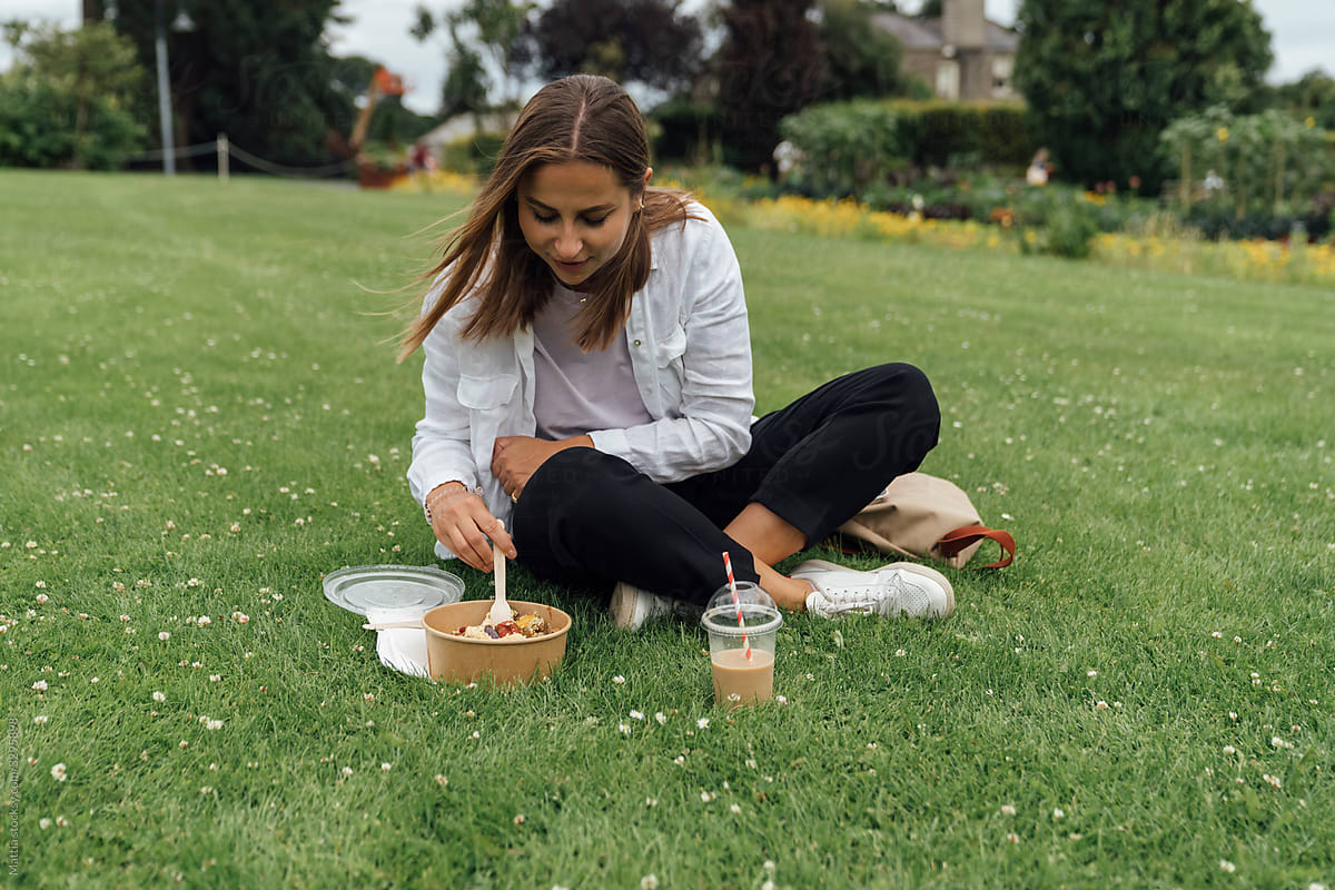 Woman Eating in the Park