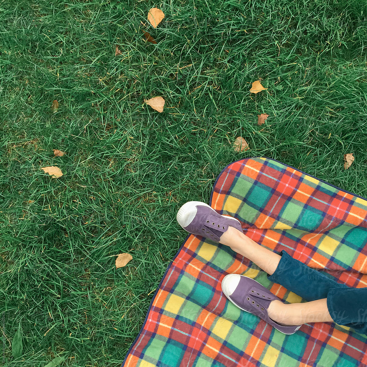 Picnic rug (and legs) on an early autumnal day