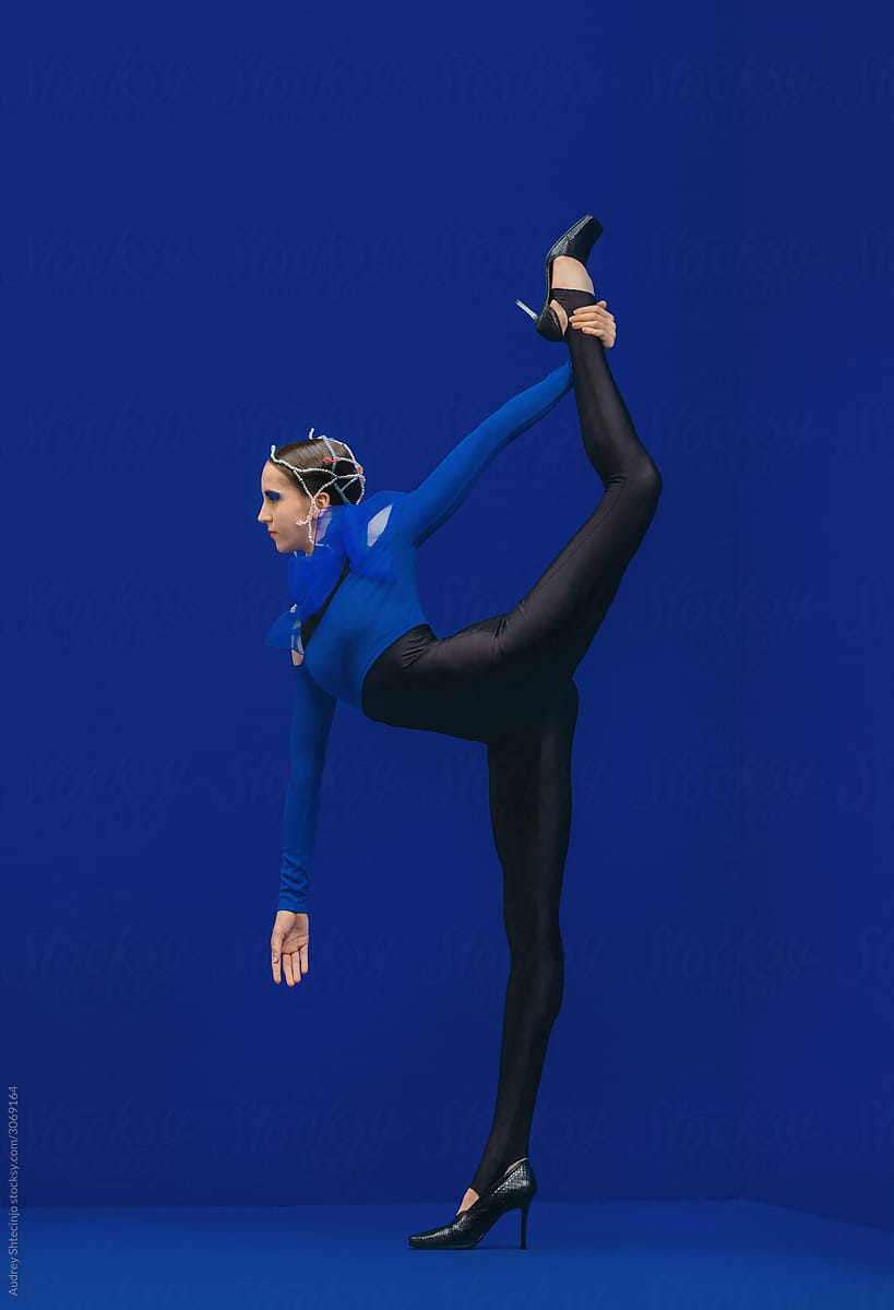 Fashion Gymnastic  In Blue Abstract Space .