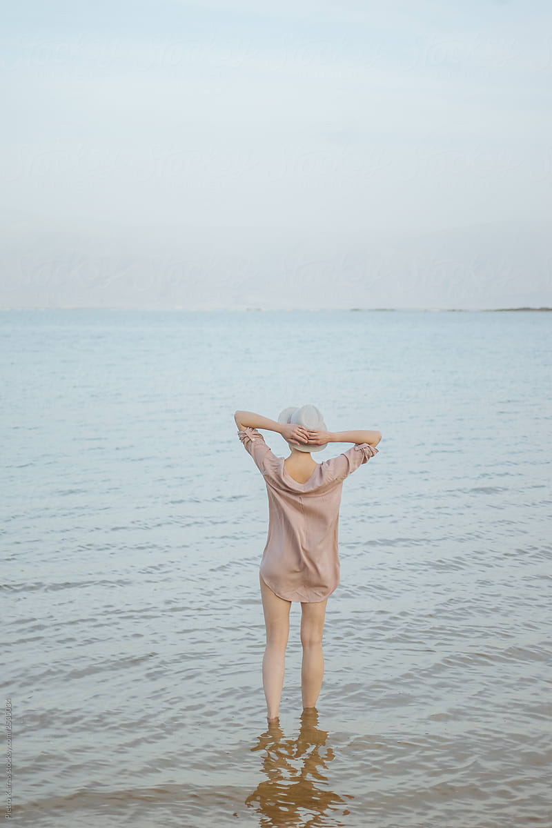 Anonymous sensual woman in salty lake