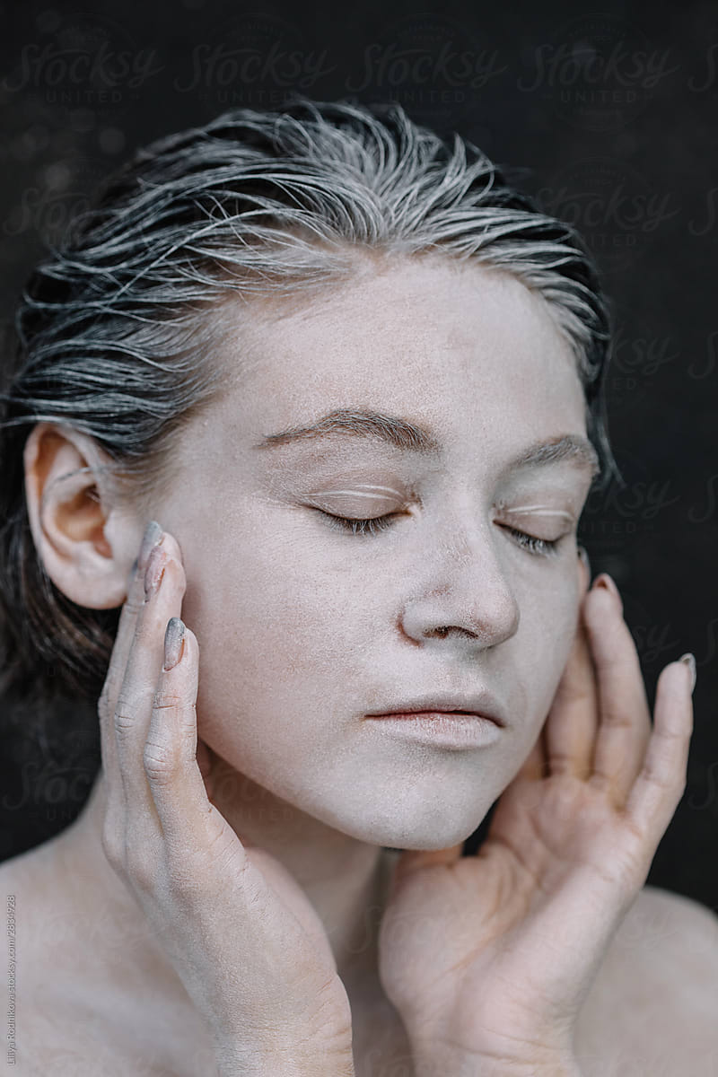 White skinned woman with closed eyes