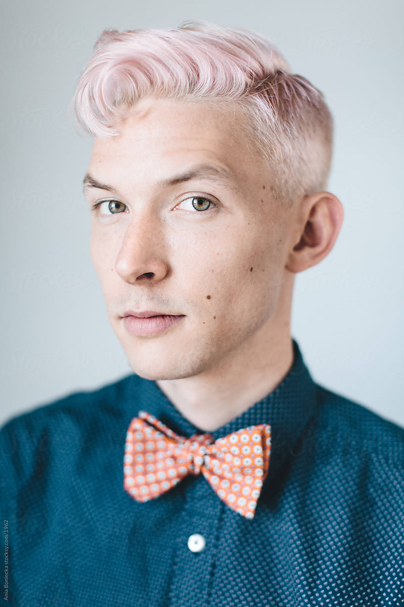 Man with pink hair & bow tie
