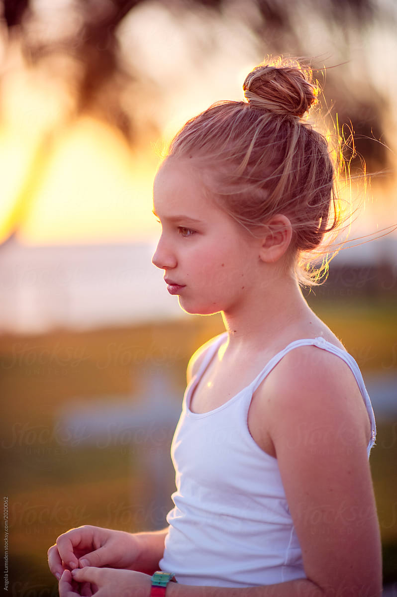 Portrait Of A Pre Teenage Girl At Sunset By Stocksy Contributor Angela Lumsden Stocksy 