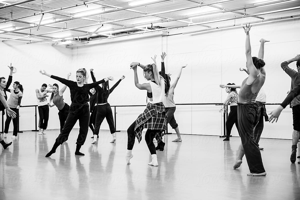 Dancers practicing their routine in studio