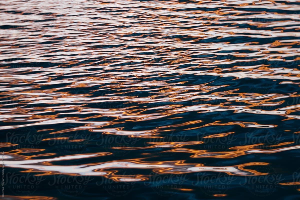 Ripples on water at sunset