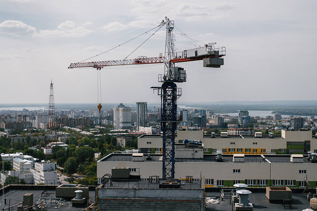 building crane above the city line