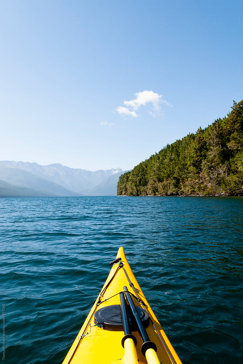 Sea kayaking Rotoroa Lake, New Zealand.