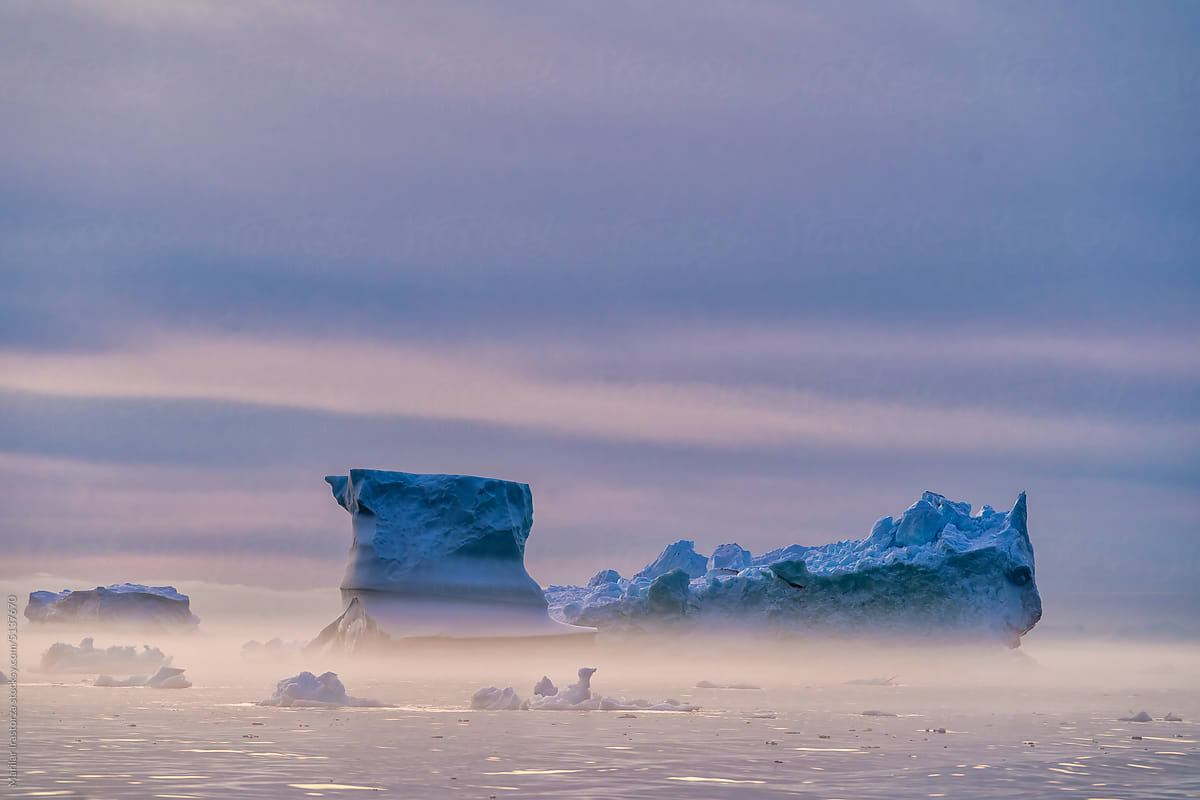 Icebergs In The Mist During Midnight Sun