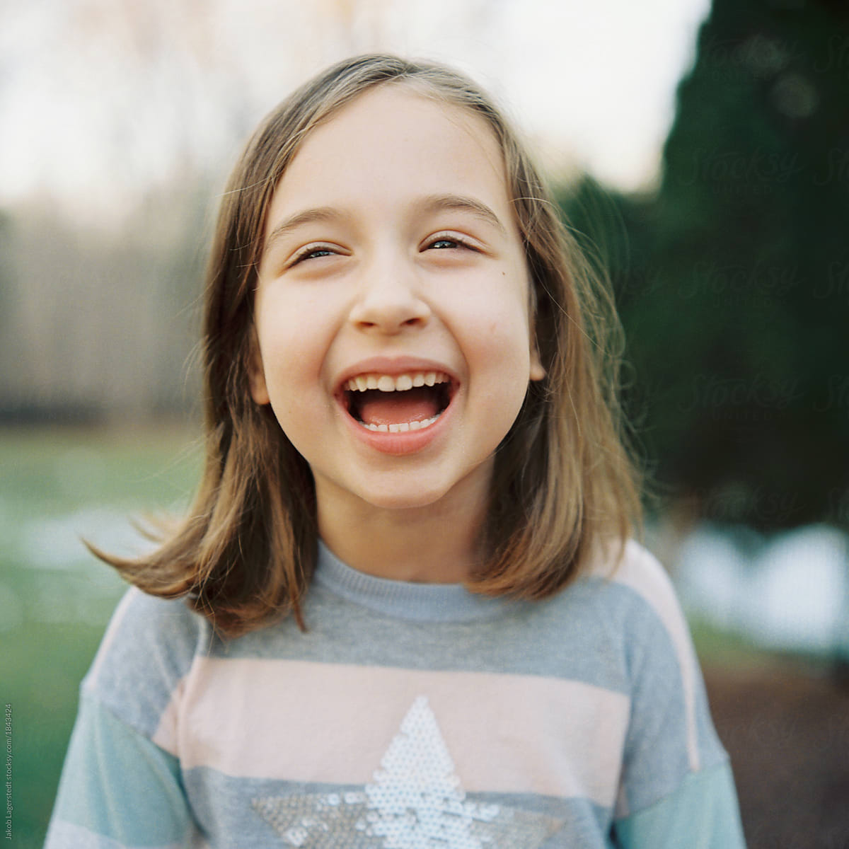 Cute Young Girl Laughing by Jakob Lagerstedt - Young Girl ...