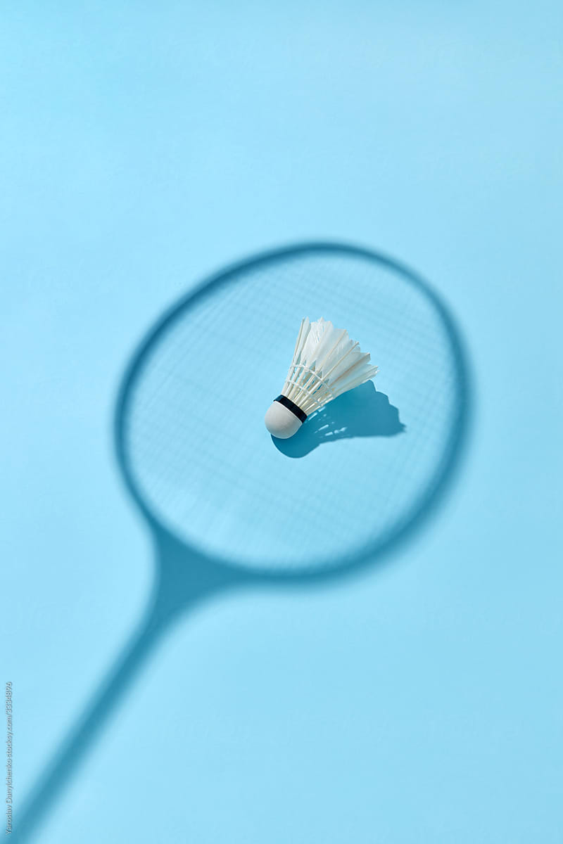 Shadow from badminton racket with real shuttlecock.