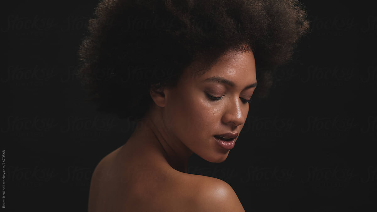 Black Woman Beauty Shot On Dark Background