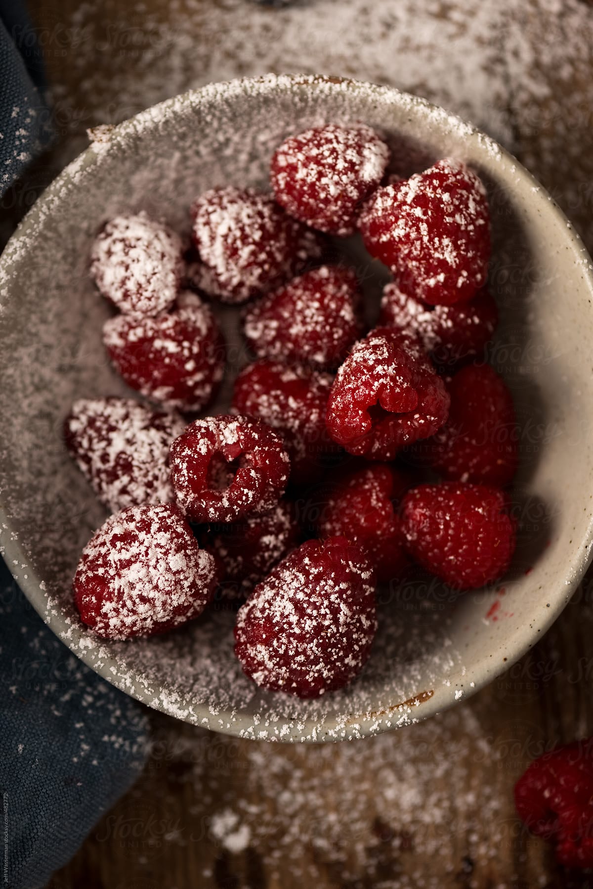 Raspberries Covered in Icing Sugar