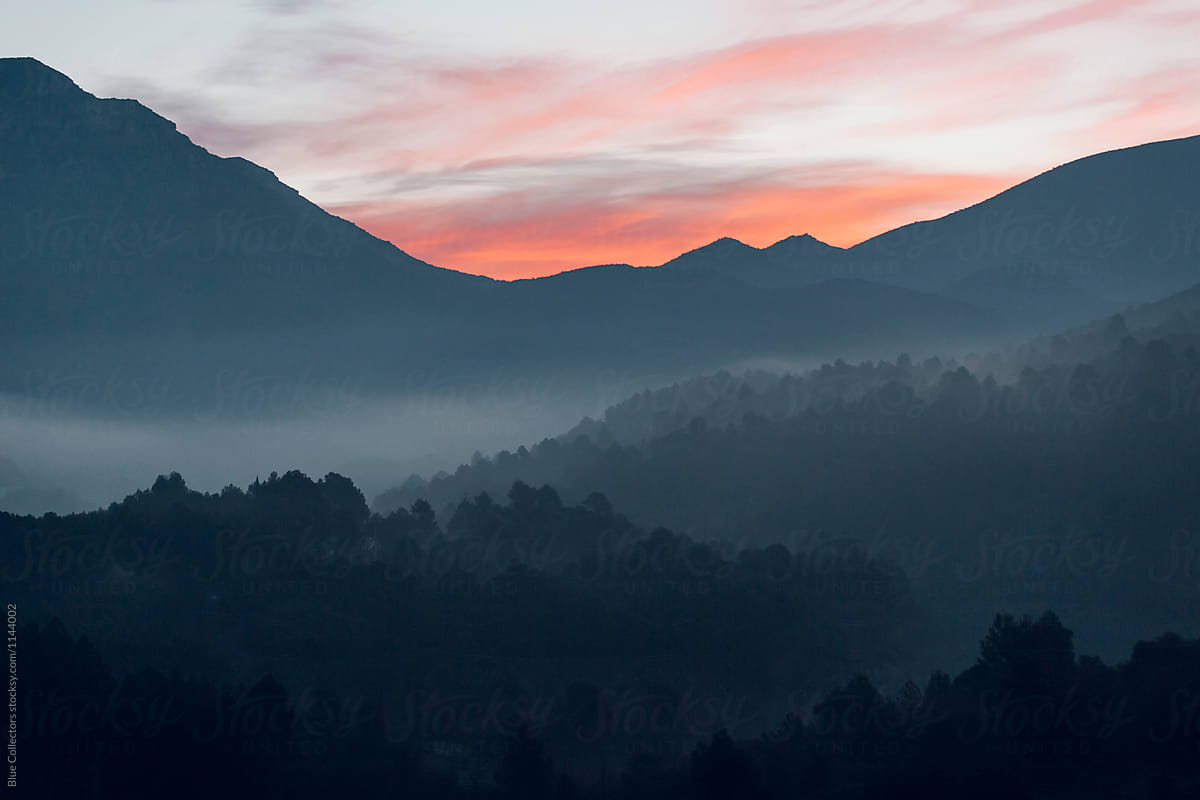 Foggy Sunrise In The Mountain Valley By Stocksy Contributor Blue
