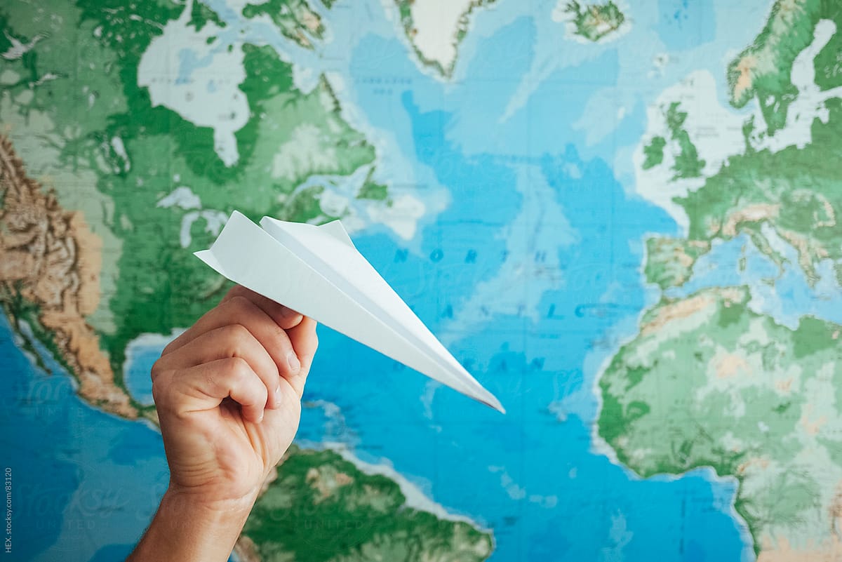 Paper Airplane with World Map