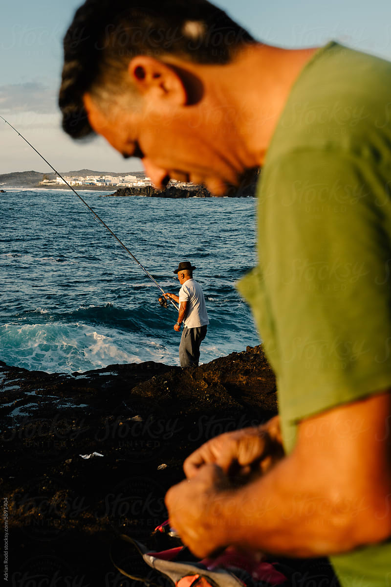 Fisherman prepares his gear for recreational fishing