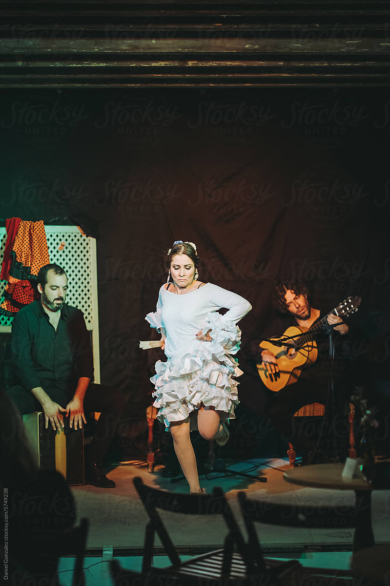 Spanish flamenco music group performing on stage
