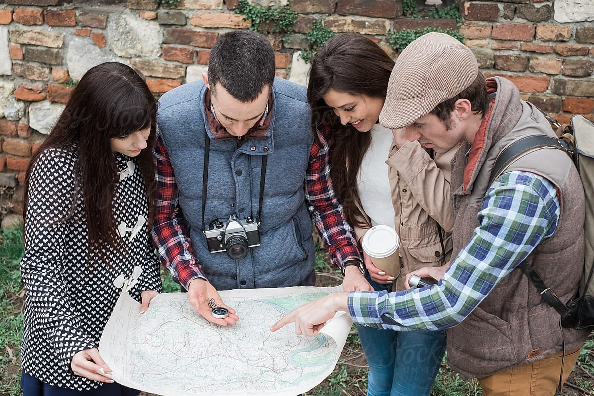 Friends Looking at the Map for Directions