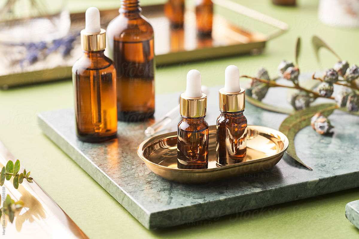 Set of essential oils on marble tray