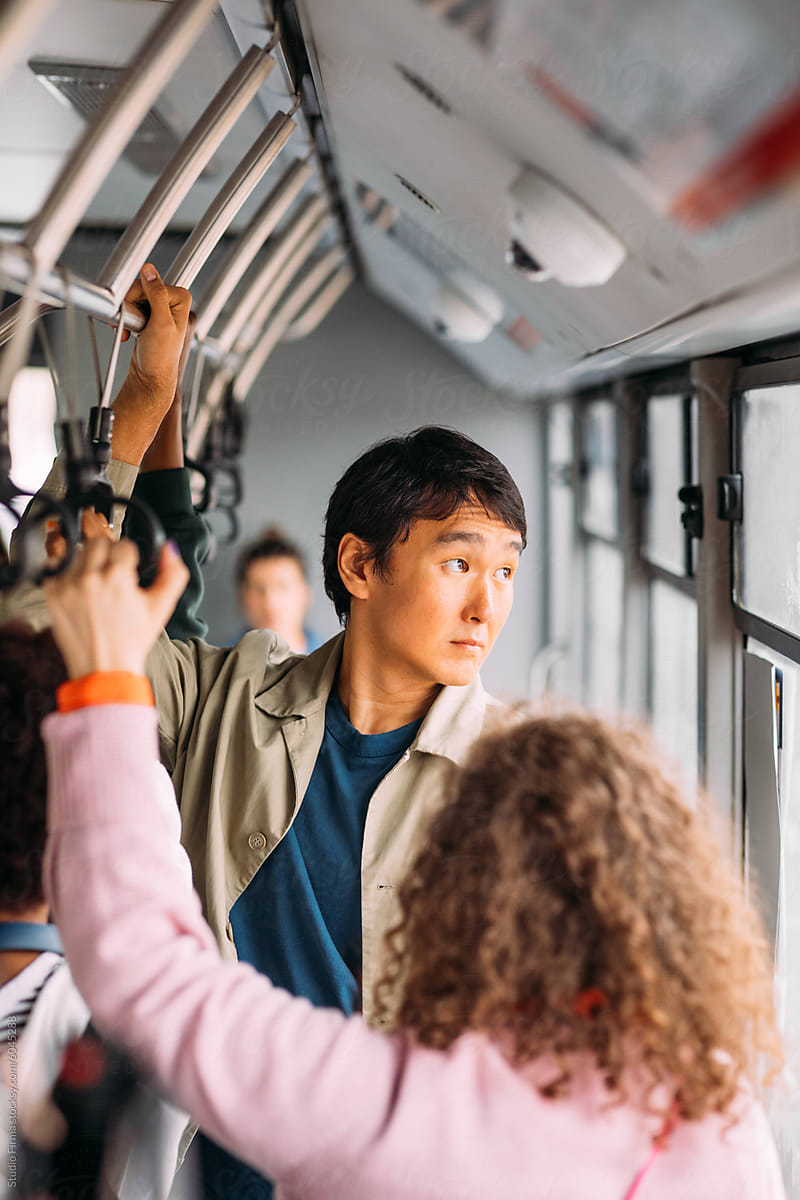 Asian man in bus