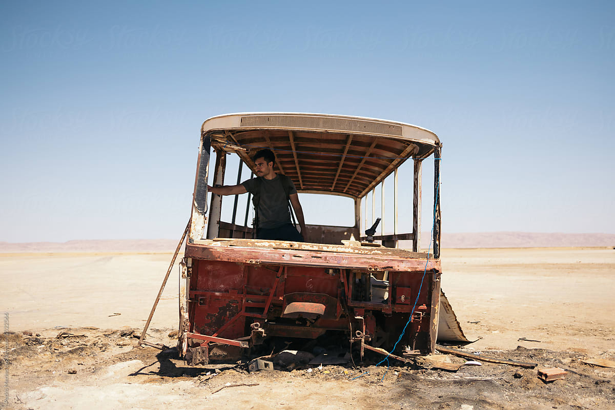 abandoned bus in the Sahara desert