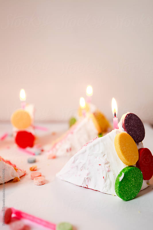 Birthday Cake sliced up with Candles