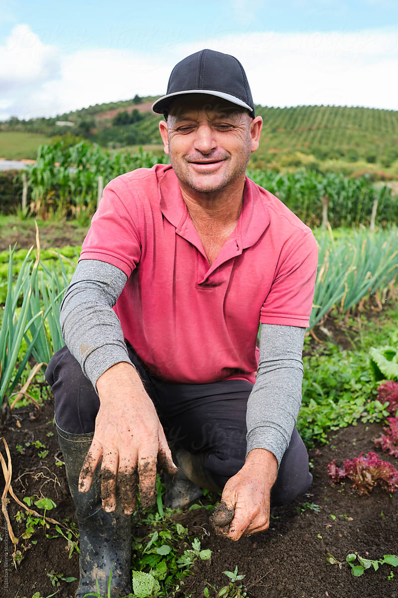 Portrait of happy farmer at work